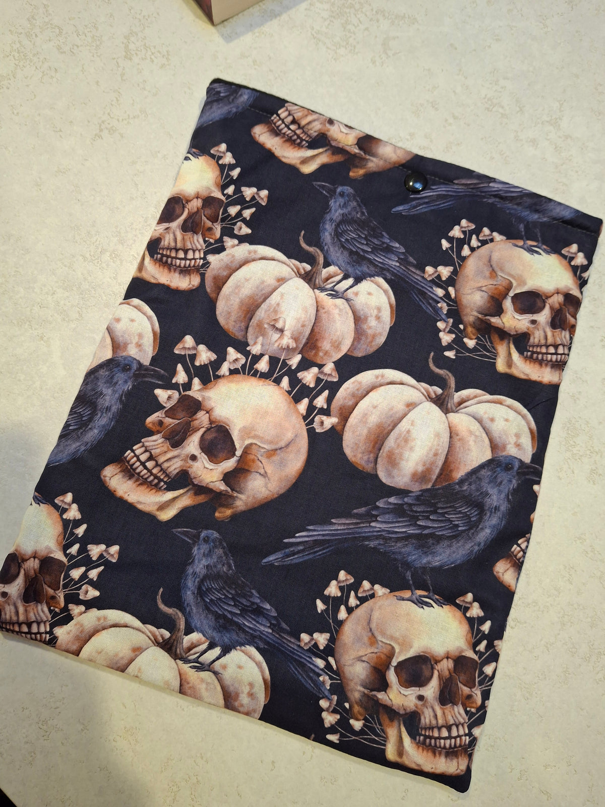 Crow and skull book sleeve