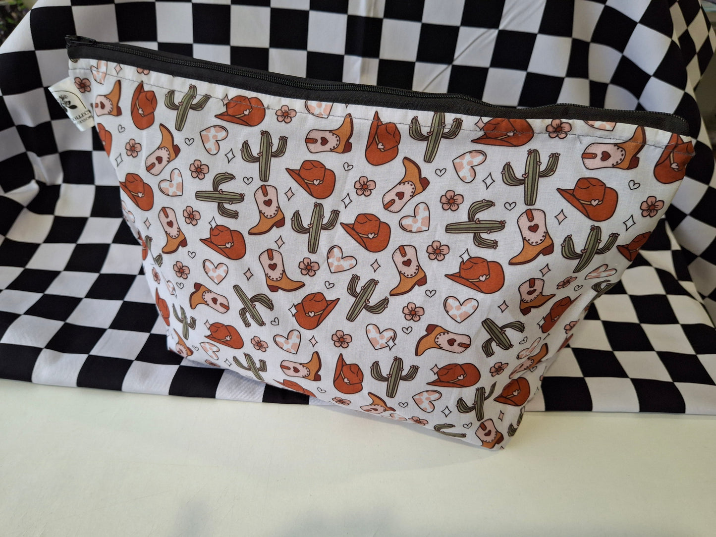 Cowboys and cactus makeup bag