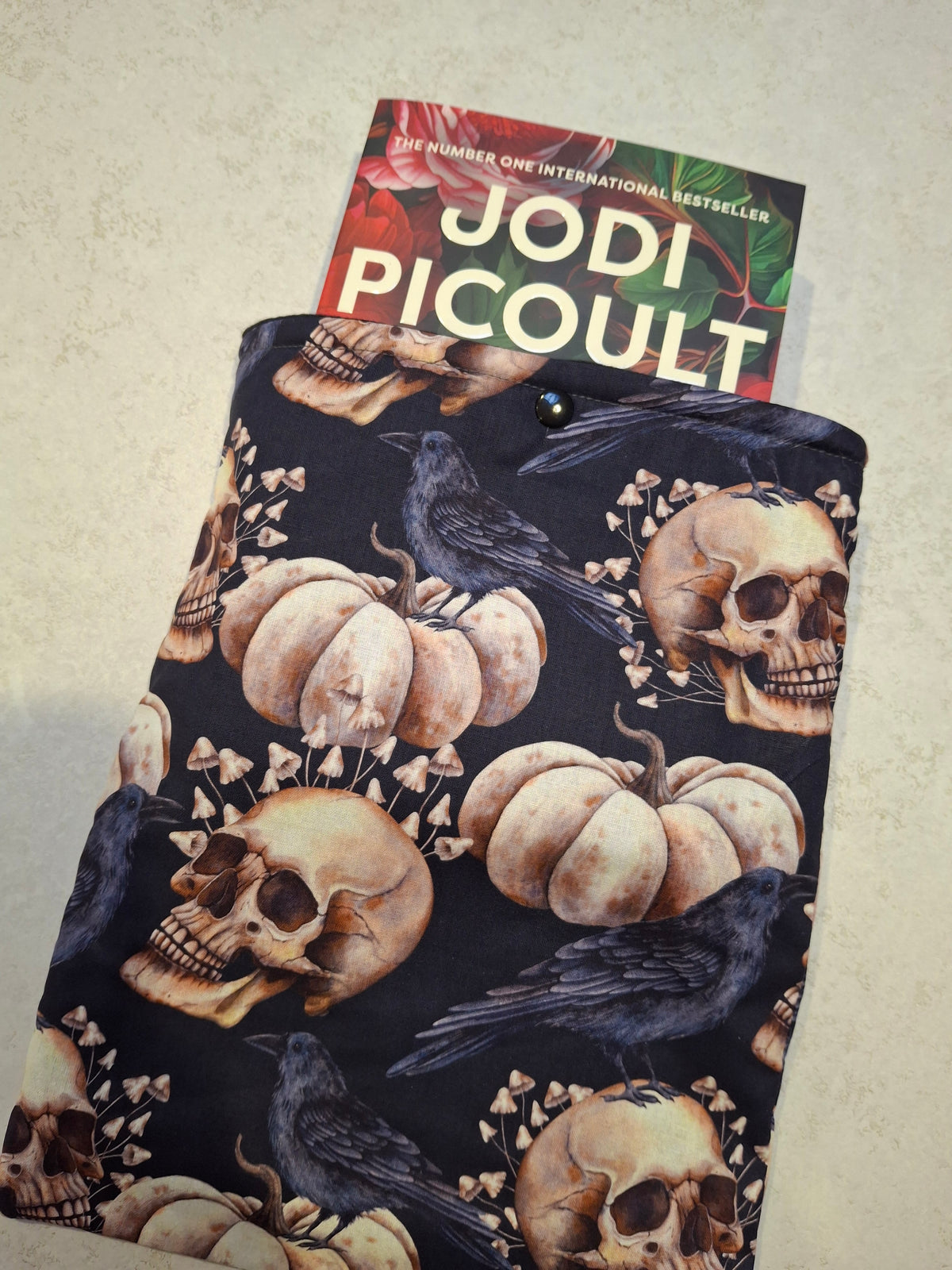 Crow and skull book sleeve