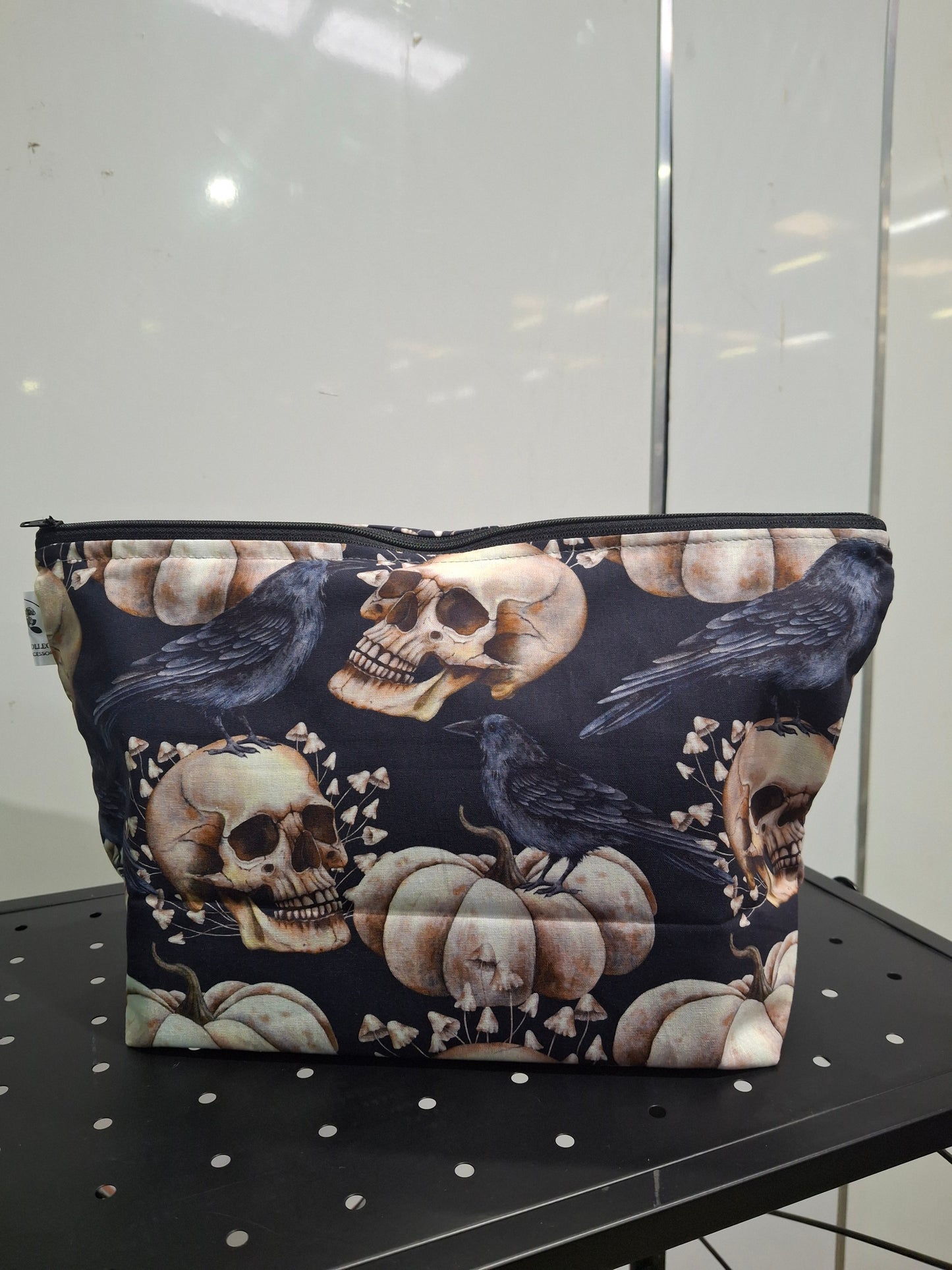 Crows and skulls makeup bag