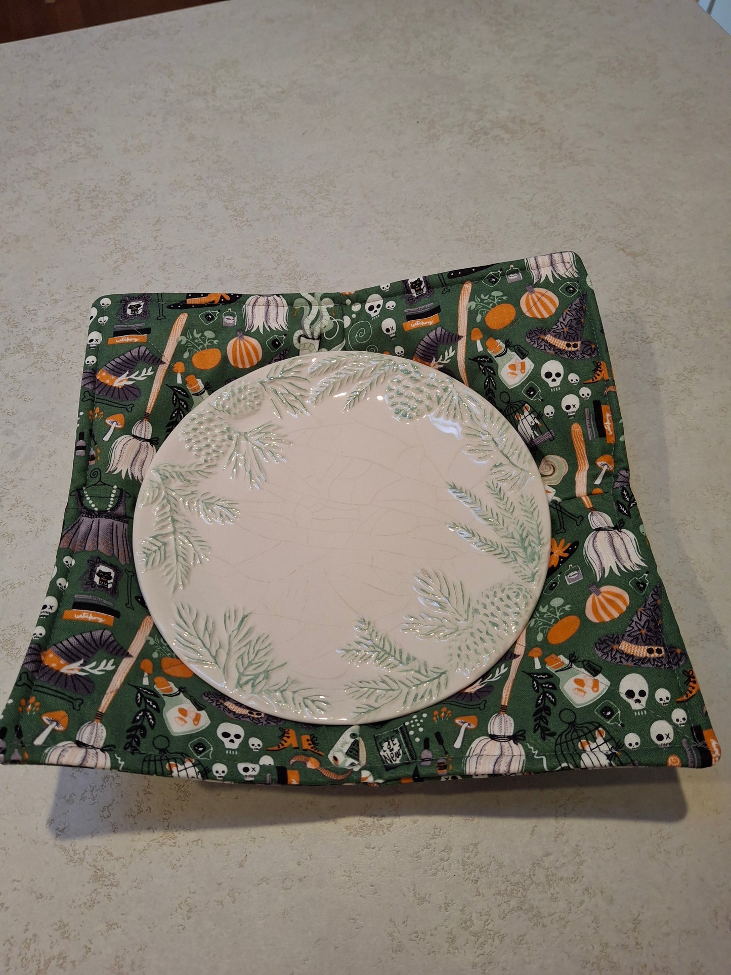 Green witch  plate cosy