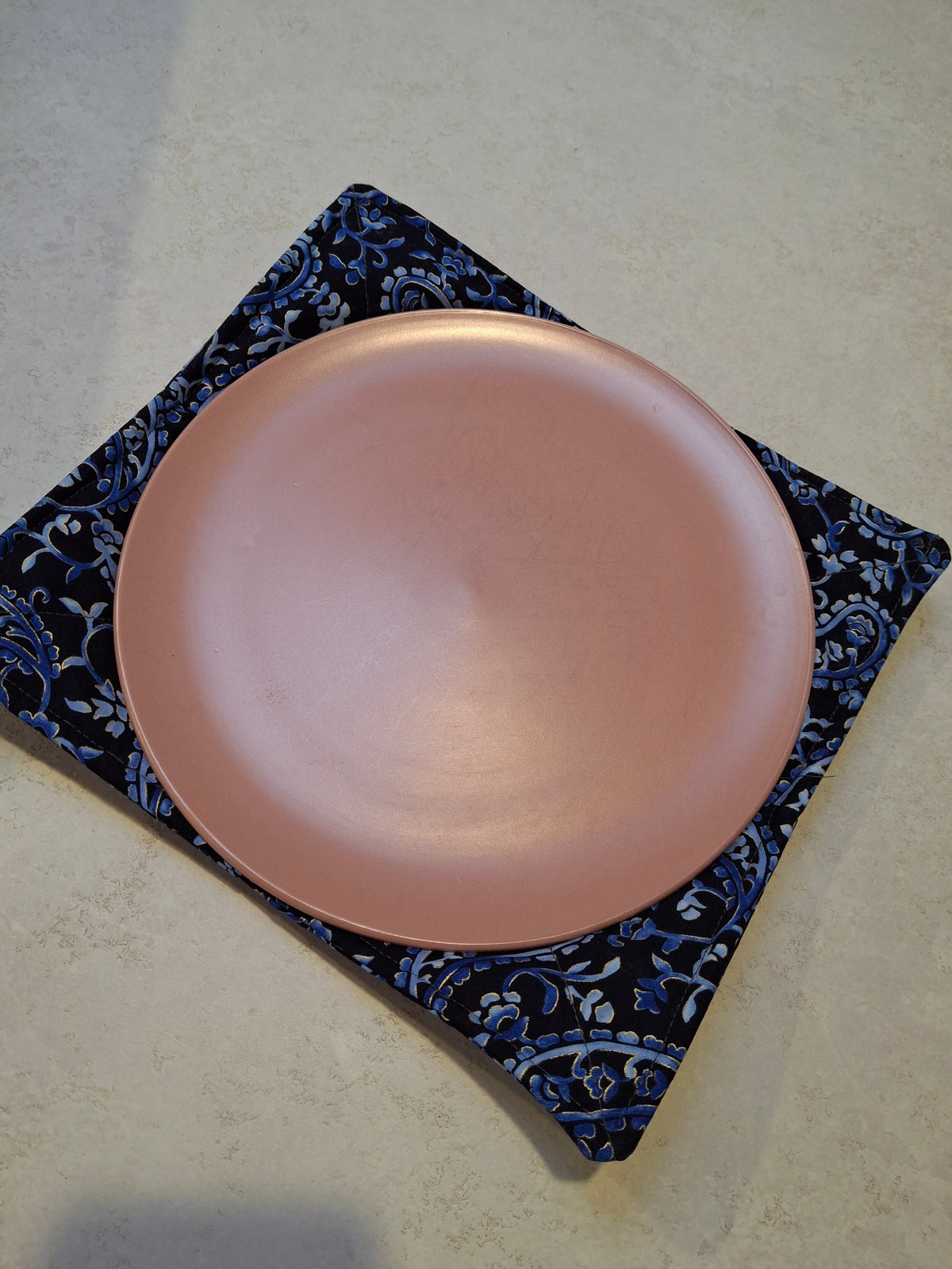 Blue paisley plate cosy