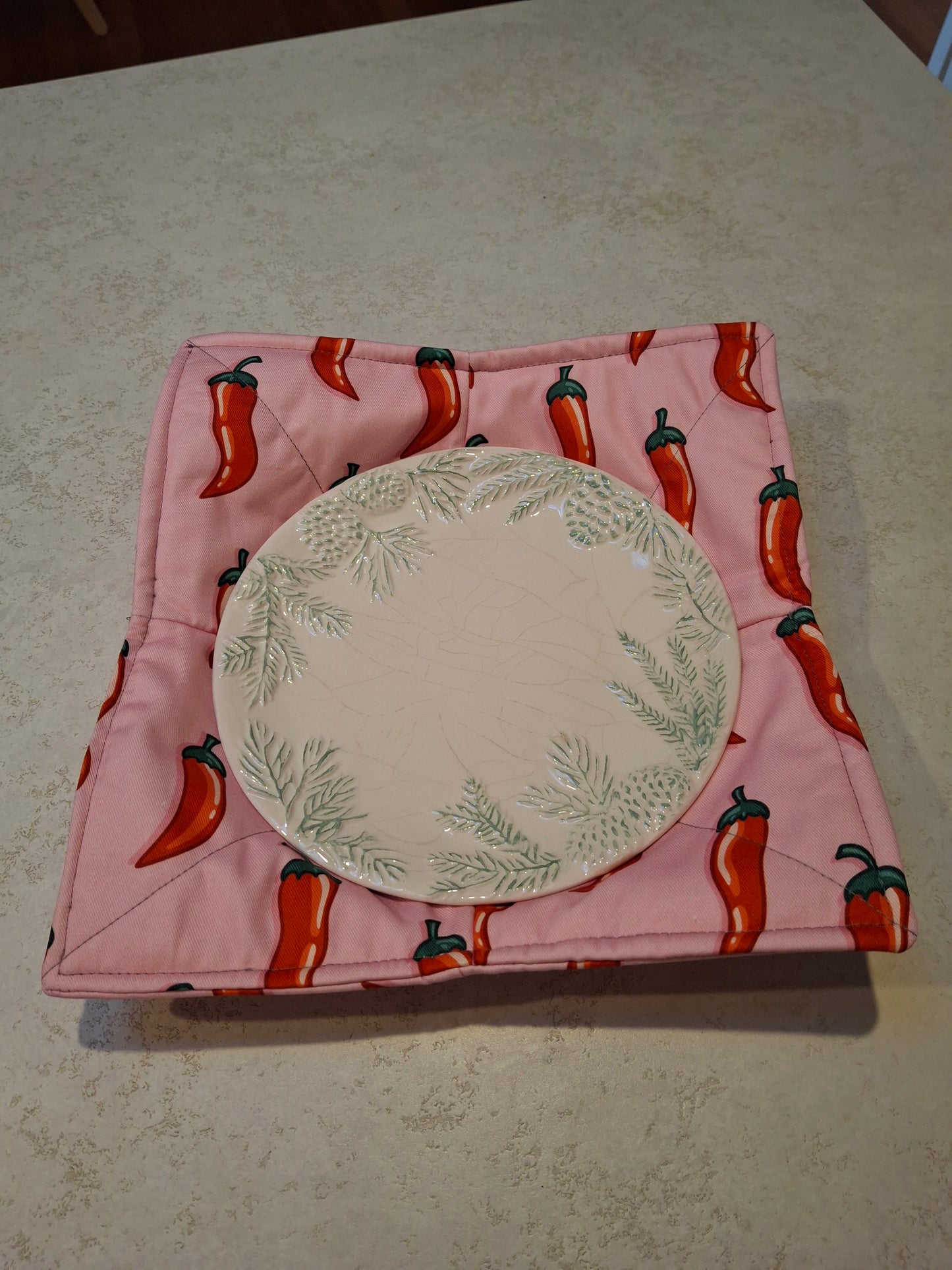 Pink Chilli plate cosy