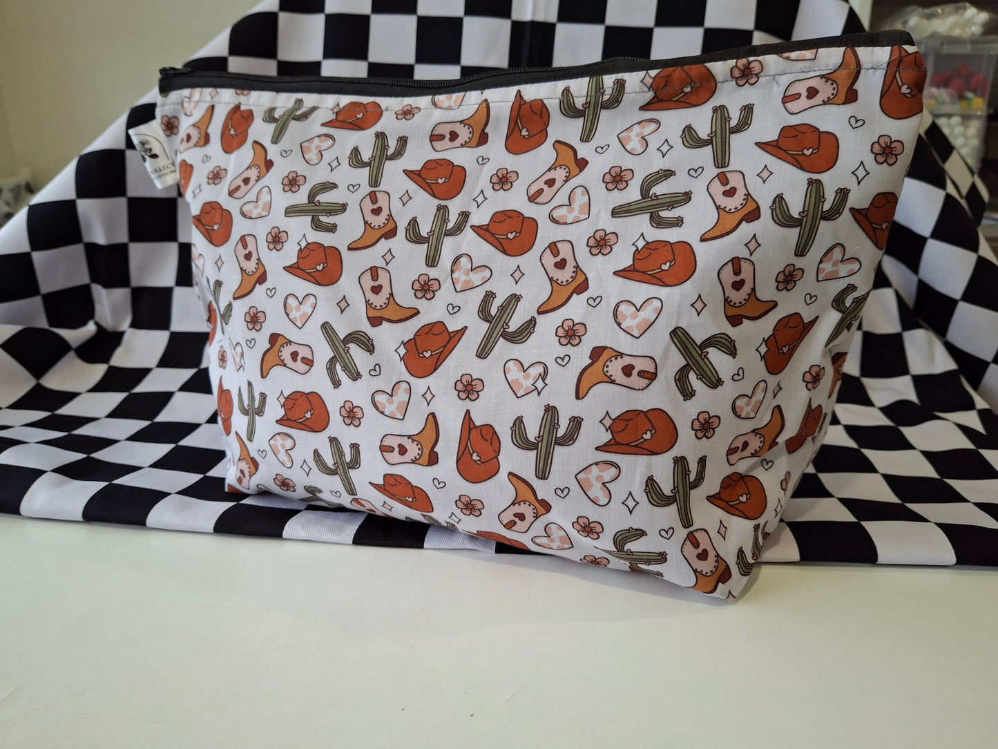 Cowboys and cactus makeup bag